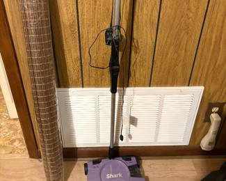 Shark Vacuum and to left - cloth roll