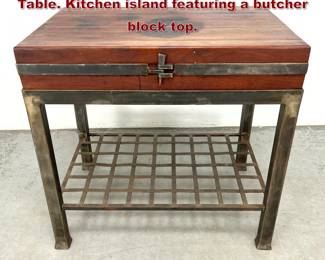 Lot 624 Heavy Butcher Block and Steel Work Table. Kitchen island featuring a butcher block top. 