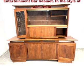 Lot 971 Large Mid Century Modern Entertainment Bar Cabinet. In the style of John Keal 