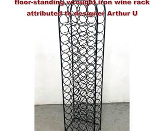 Lot 867 Arthur Umanoff Wine Rack tall, floorstanding wrought iron wine rack attributed to designer Arthur U