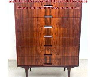 Lot 666 Svante Skogh for Seffle Book matched Rosewood Chest of Drawers featured solid brass accents.