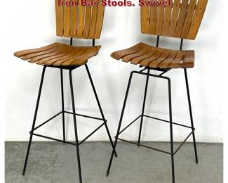 Lot 1078 Pair Arthur Umanoff Wood Slat and Iron Bar Stools. Swivel