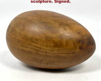 Lot 603 Ron Kent turned wood egg sculpture. Signed. 