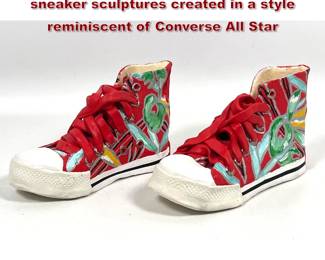 Lot 883 Pair of handmodeled ceramic sneaker sculptures created in a style reminiscent of Converse All Star 