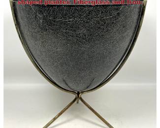 Lot 936 Kimball MidCentury Modern bulletshaped planter. Fiberglass and Iron. 