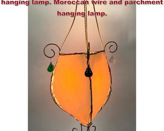 Lot 1012 Moroccan wire and parchment hanging lamp. Moroccan wire and parchment hanging lamp.