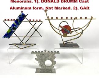 Lot 869 3pc Contemporary American Artisan Menorahs. 1. DONALD DRUMM Cast Aluminum form. Not Marked. 2. GAR