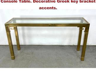Lot 1060 Mastercraft Style Brass and Glass Console Table. Decorative Greek key bracket accents. 