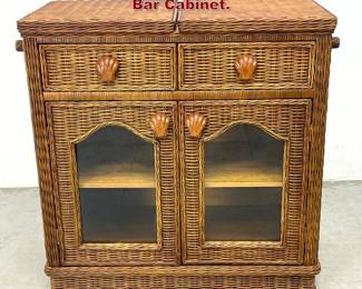 Lot 1053 Woven Wicker Rattan Flip Top Bar Cabinet. 