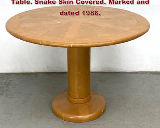 Lot 916 Karl Springer Round Cafe Dining Table. Snake Skin Covered. Marked and dated 1988. 
