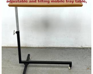 Lot 1025 Metlex MidCentury Modern heightadjustable and tilting mobile tray table, 