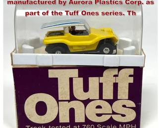 Lot 1573 HO scale electric slot car manufactured by Aurora Plastics Corp. as part of the Tuff Ones series. Th
