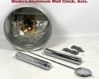 Lot 1511 Howard Miller Clock Mid Century Modern Aluminum Wall Clock. Asis. 