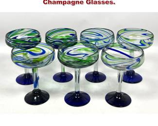 Lot 1501 Set 7 Art Glass Swirl Champagne Glasses. 