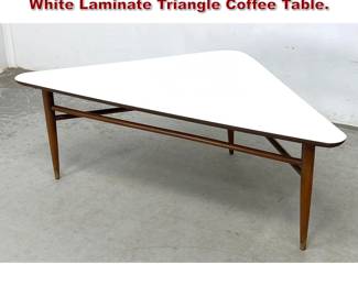 Lot 1306 Mid Century Modern Walnut and White Laminate Triangle Coffee Table. 