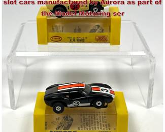 Lot 1592 Pair of vintage HO scale electric slot cars manufactured by Aurora as part of the Model Motoring ser