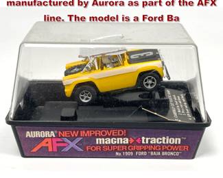 Lot 1579 HOscale electric slot car is manufactured by Aurora as part of the AFX line. The model is a Ford Ba