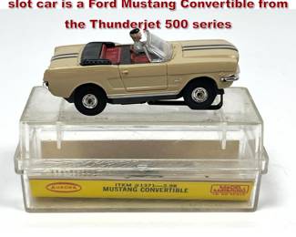 Lot 1601 Aurora Model Motoring HO scale slot car is a Ford Mustang Convertible from the Thunderjet 500 series