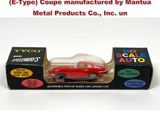 Lot 1595 HO scale slot car is a Jaguar XKE EType Coupe manufactured by Mantua Metal Products Co., Inc. un