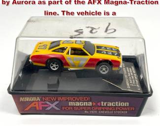 Lot 1577 HO scale slot car is manufactured by Aurora as part of the AFX MagnaTraction line. The vehicle is a