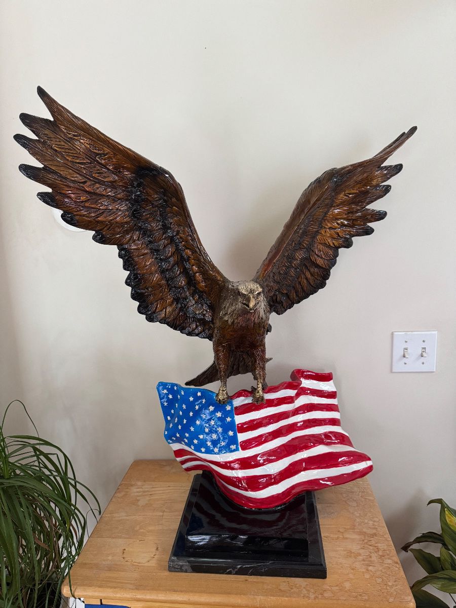 Bronze eagle with American flag