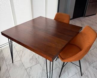 Elegant, mid-century style table with chairs