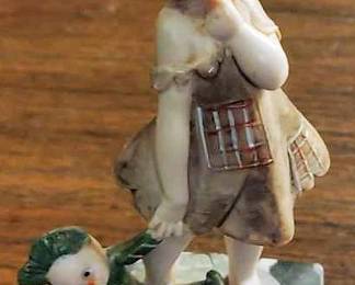 Baby Girl with Her Doll on Marble