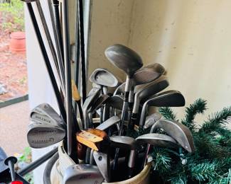Golf club set plus a lot of golf items