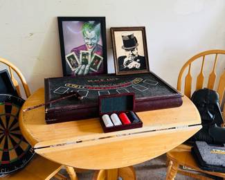 Two seater drop leaf table with two chairs. Poker items.