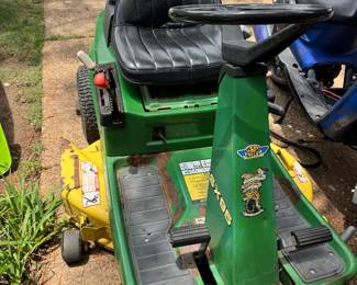 Older riding mower works