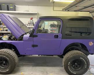 Jeep Wrangler on steroids !   Addl' l pic with more details.  