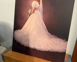 This beautiful wedding dress can be found in the doll room. The photo shows what the dress in the box looks likes! 