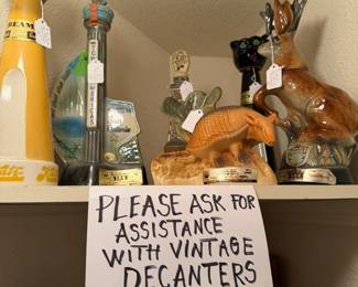 As the sign says, please ask for help if you can not reach these fabulous decanters