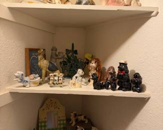 Vintage dog collection, including chalk, tins, and art