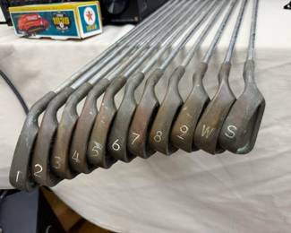 We have a super collection of vintage golf clubs. Here we have a set (1 - SW) of Ping Eye2 Black Dot Beryllium Copper Irons with matching serial numbers.