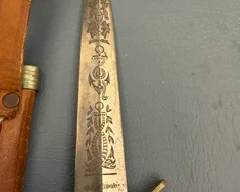 Decorative etched blade