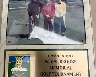 Here is Dr. Railsback standing to the left of Mark Brooks PGA Golfer.