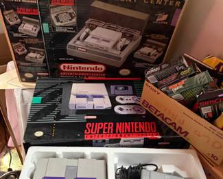 Vintage NINTENDO console with games ( we are looking for the generic power cord )