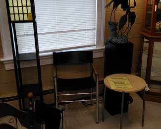 Mid-Century Arm Chrome and leather arm chair and magazine holder, Metal Stork figurine, modern floor lamp