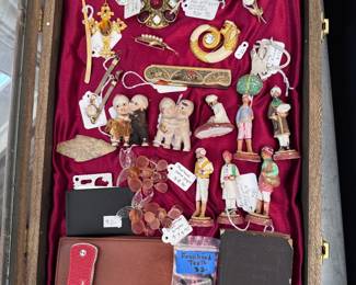 Beautiful selection of costume jewelry, vintage, unique items, and more. And I see a COACH item in there!