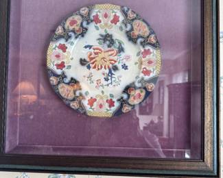 One of a pair of antique framed ironstone plates