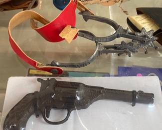 Toys Spurs and Cast-Iron Cap Gun