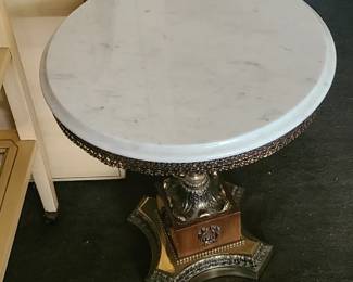 Two Cherub Pedestal tables with removable marble tops