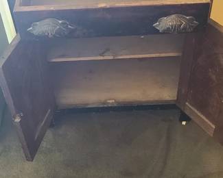 Inside of Antique Stand Alone Cabinet.