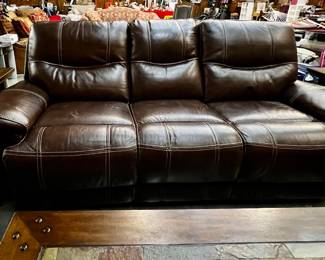 Reclining leather sofa