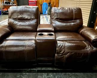 Reclining leather loveseat