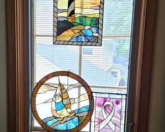 Small stained-glass panels, (items sold separately).