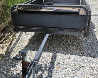 Utility trailer, front view.