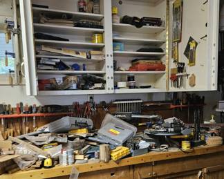 Wood gouges, chisels and other tools, (items sold separately).