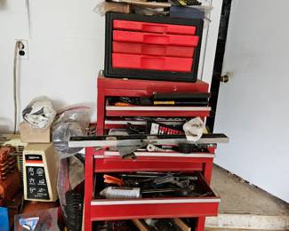 Craftwman tool chest on chest with tools, socket sets, power tools, (items sold separately).